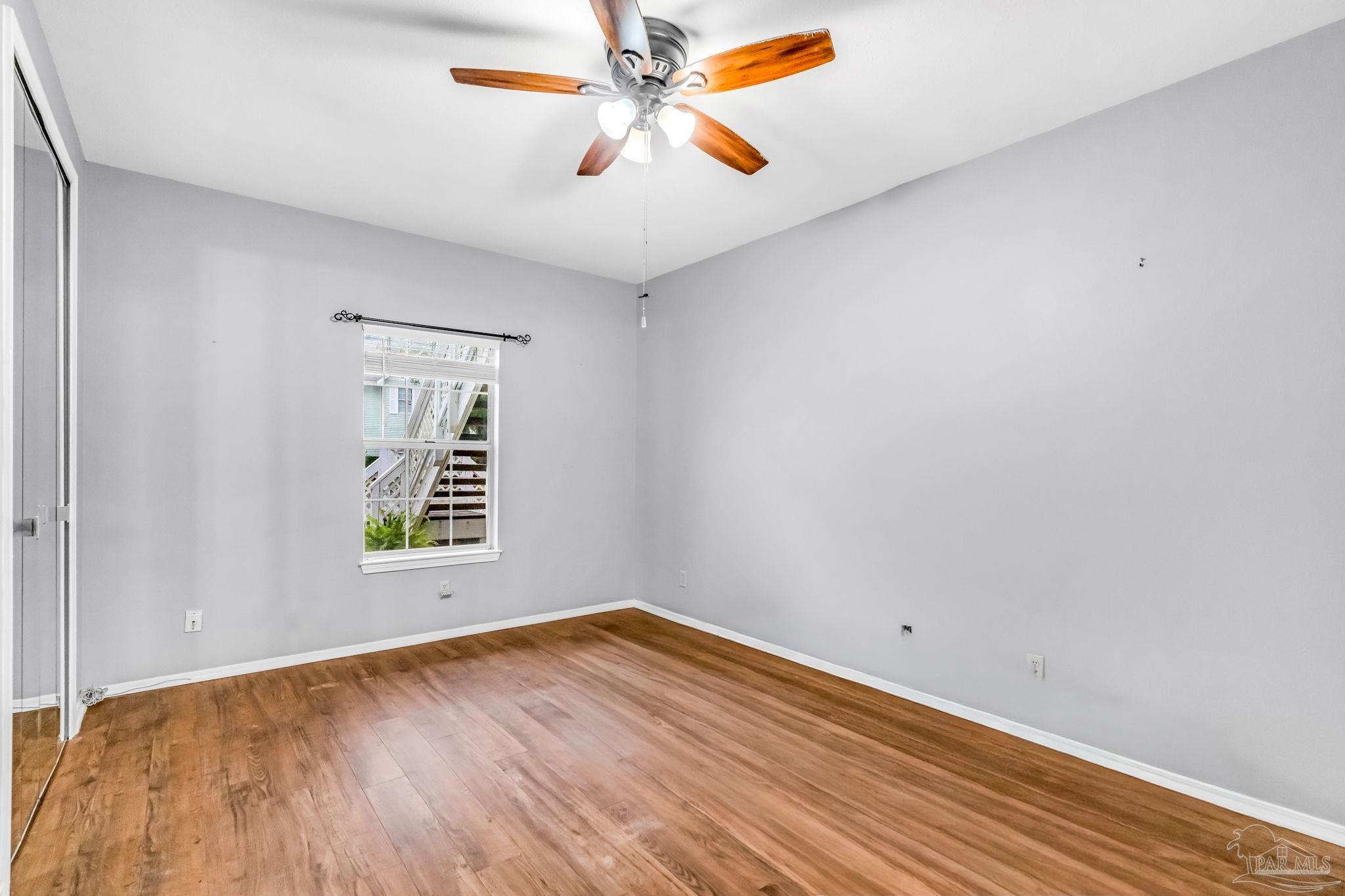 601 East Burgess Road, Unit C4 Pensacola, FL 32504 - Photo 20 of 28 wooden floor in an empty room