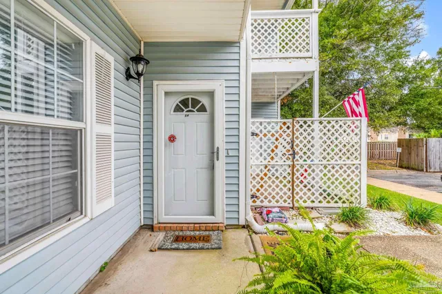 a front view of a house with a garage