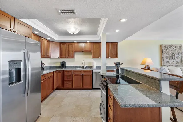 a couple of palm trees sitting in a yard with swimming pool