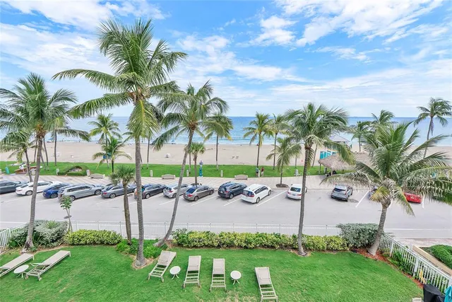 a bed room with a bed and a television