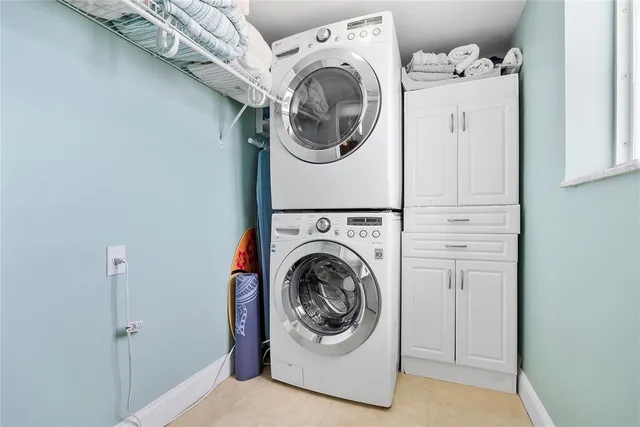 a view of a patio with a table and chairs