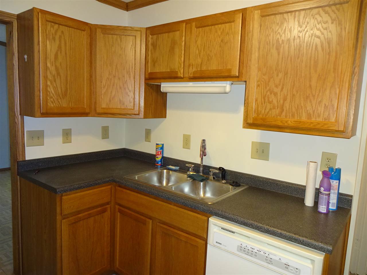 415 Brooke Road Rockford, IL 61109 - Photo 7 of 17 a kitchen with a sink cabinets and a counter top space