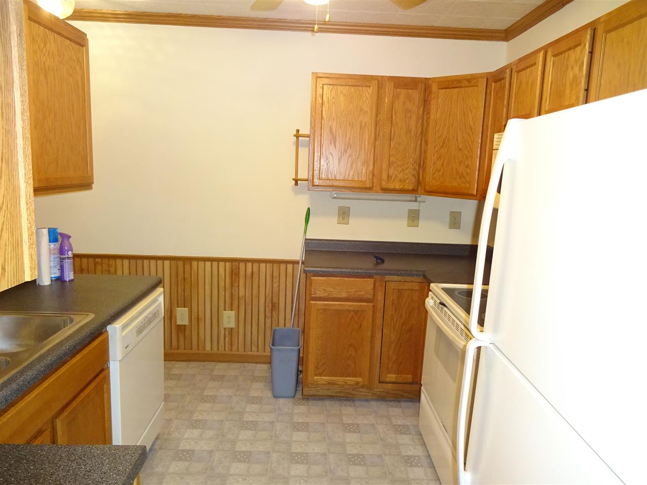 415 Brooke Road Rockford, IL 61109 - Photo 8 of 17 a bathroom with a sink and a mirror