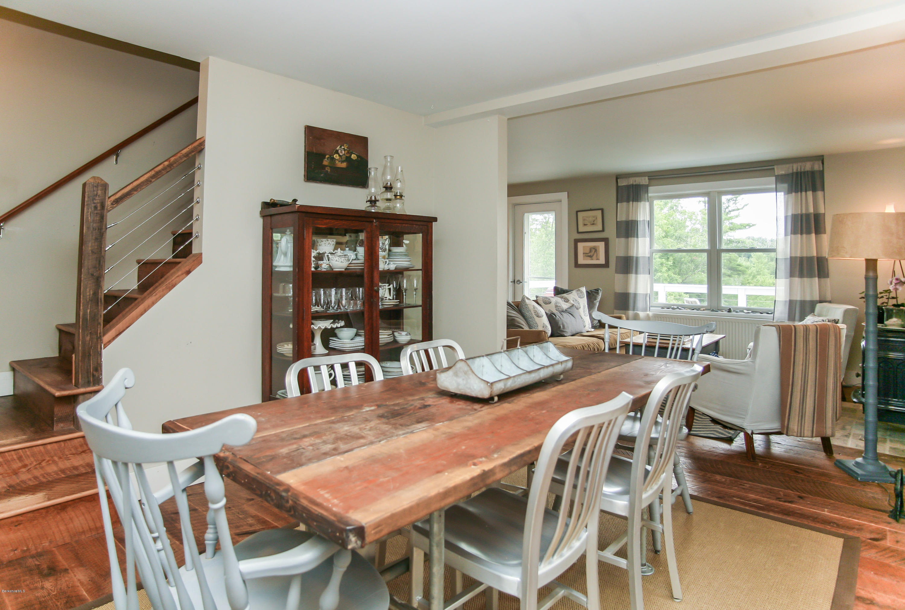 394 Main Road Monterey, MA 01245 - Photo 11 of 33 a view of a dining room with furniture and window