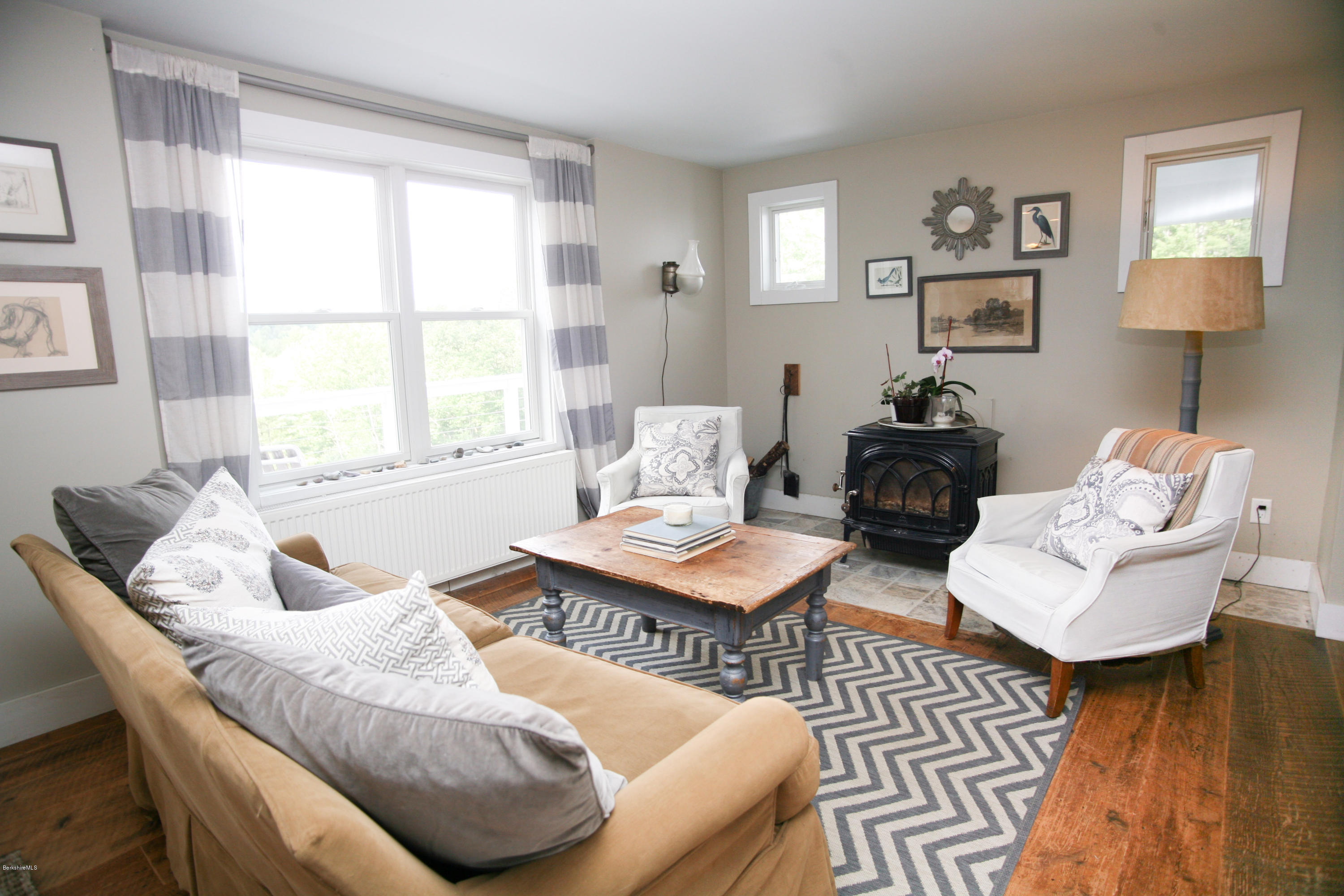 394 Main Road Monterey, MA 01245 - Photo 13 of 33 a living room with furniture and a window