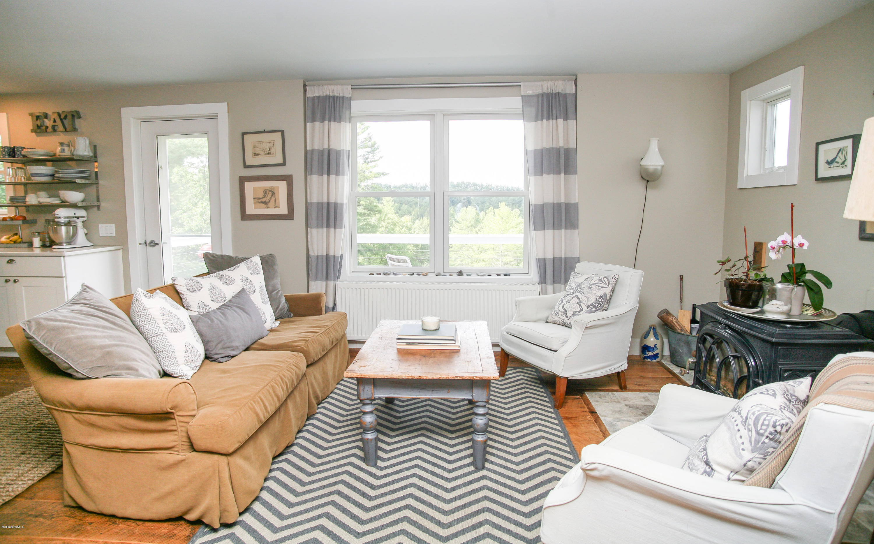 394 Main Road Monterey, MA 01245 - Photo 14 of 33 a living room with furniture and a large window