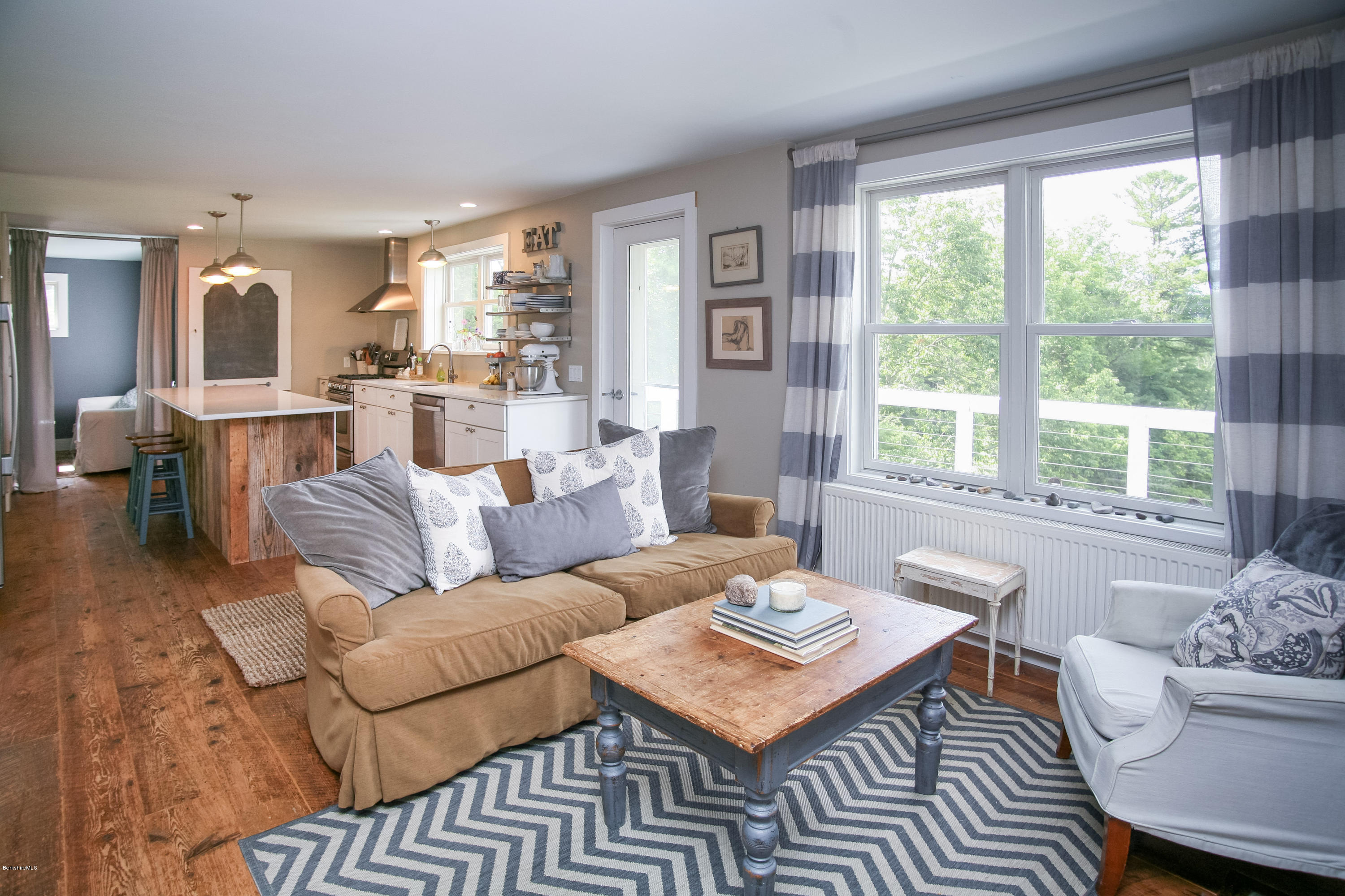 394 Main Road Monterey, MA 01245 - Photo 15 of 33 a living room with furniture and a large window