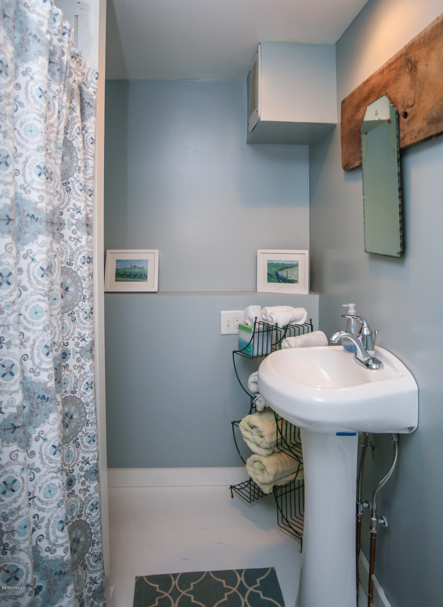 394 Main Road Monterey, MA 01245 - Photo 22 of 33 a bathroom with a sink and a mirror