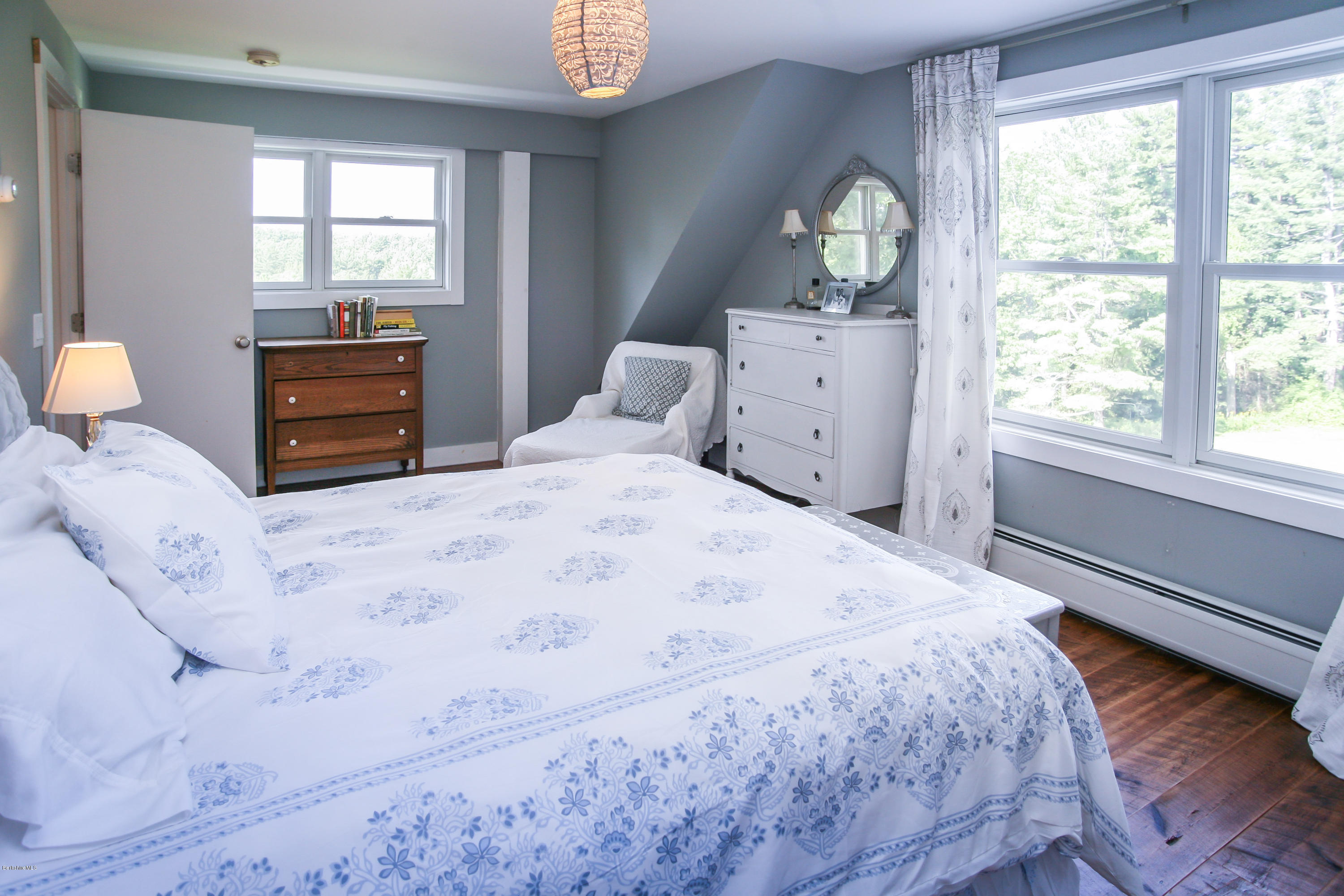 394 Main Road Monterey, MA 01245 - Photo 4 of 33 a bedroom with a bed and a window