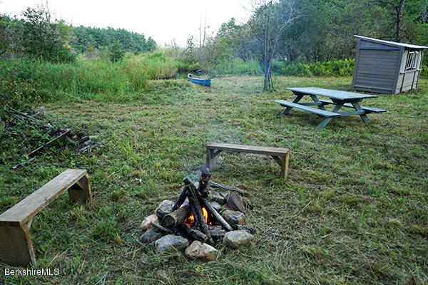 394 Main Road Monterey, MA 01245 - Photo 33 of 33 a view of a bench in a field
