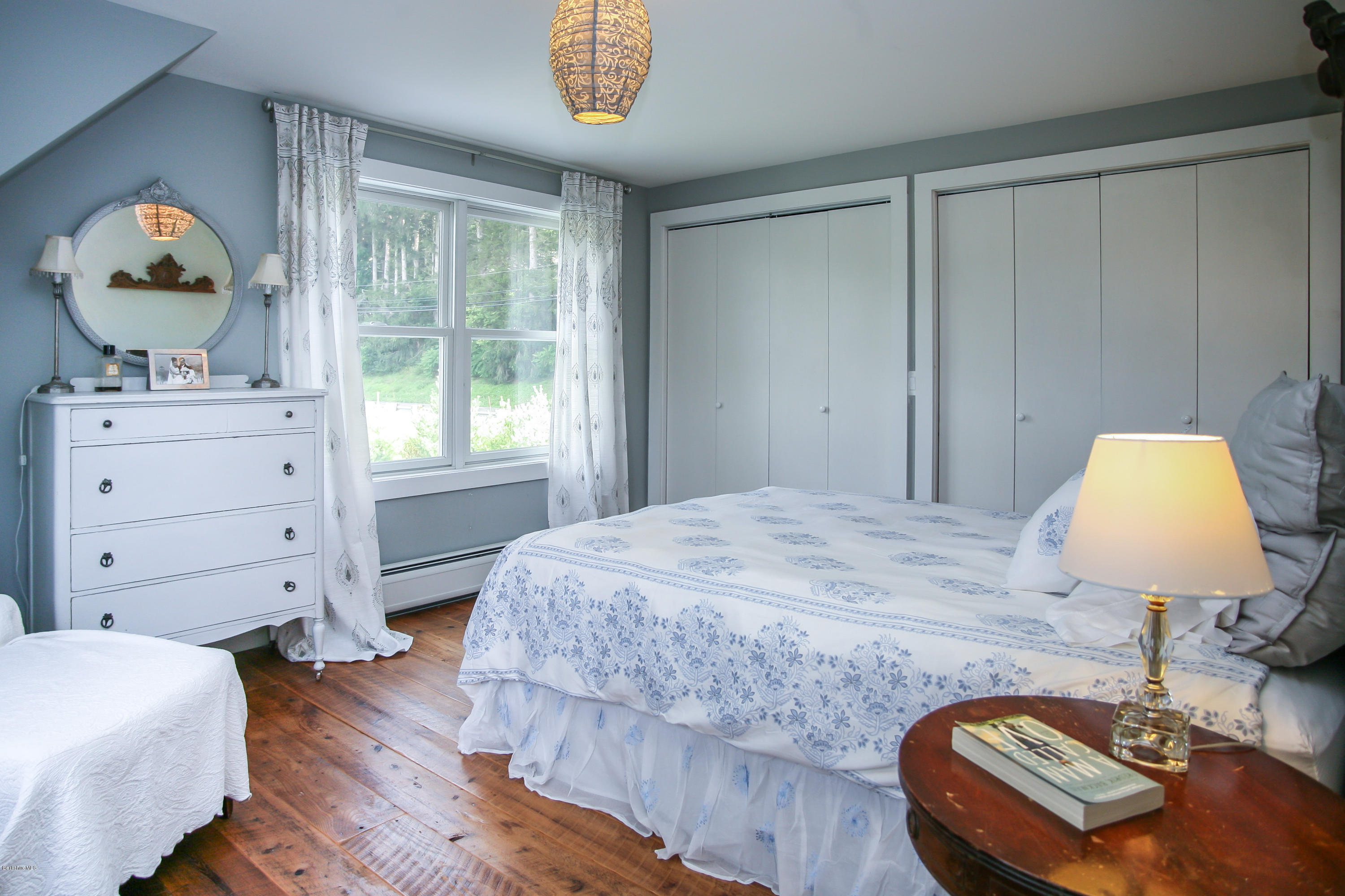 394 Main Road Monterey, MA 01245 - Photo 5 of 33 a bedroom with a bed and a dresser