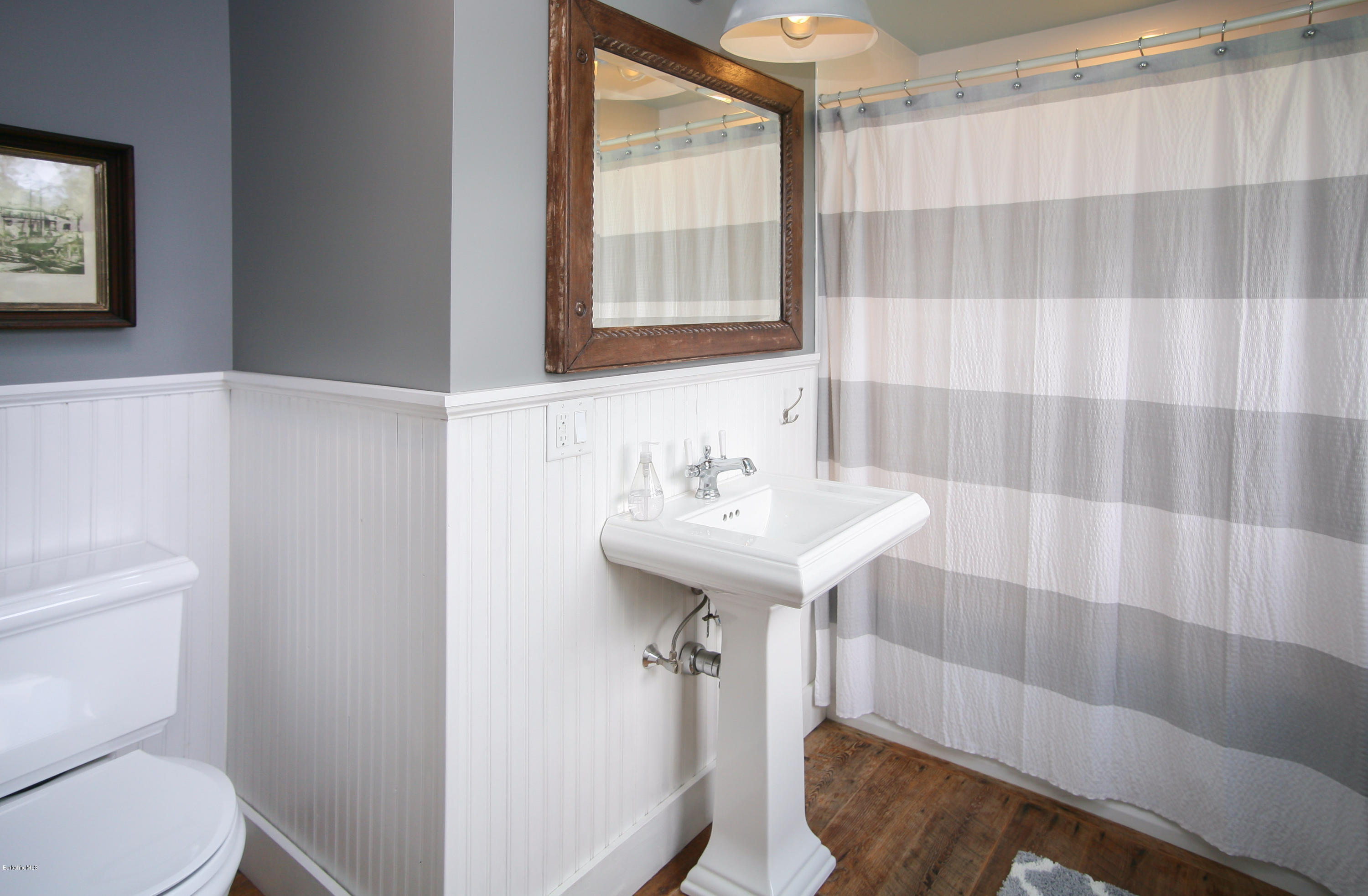 394 Main Road Monterey, MA 01245 - Photo 7 of 33 a bathroom with a sink toilet and shower