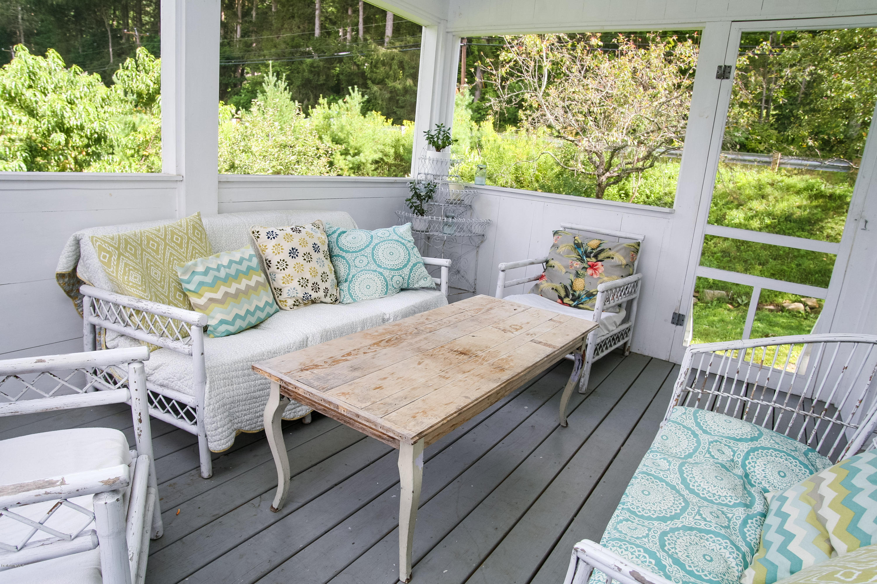 394 Main Road Monterey, MA 01245 - Photo 9 of 33 a outdoor view with a sitting space
