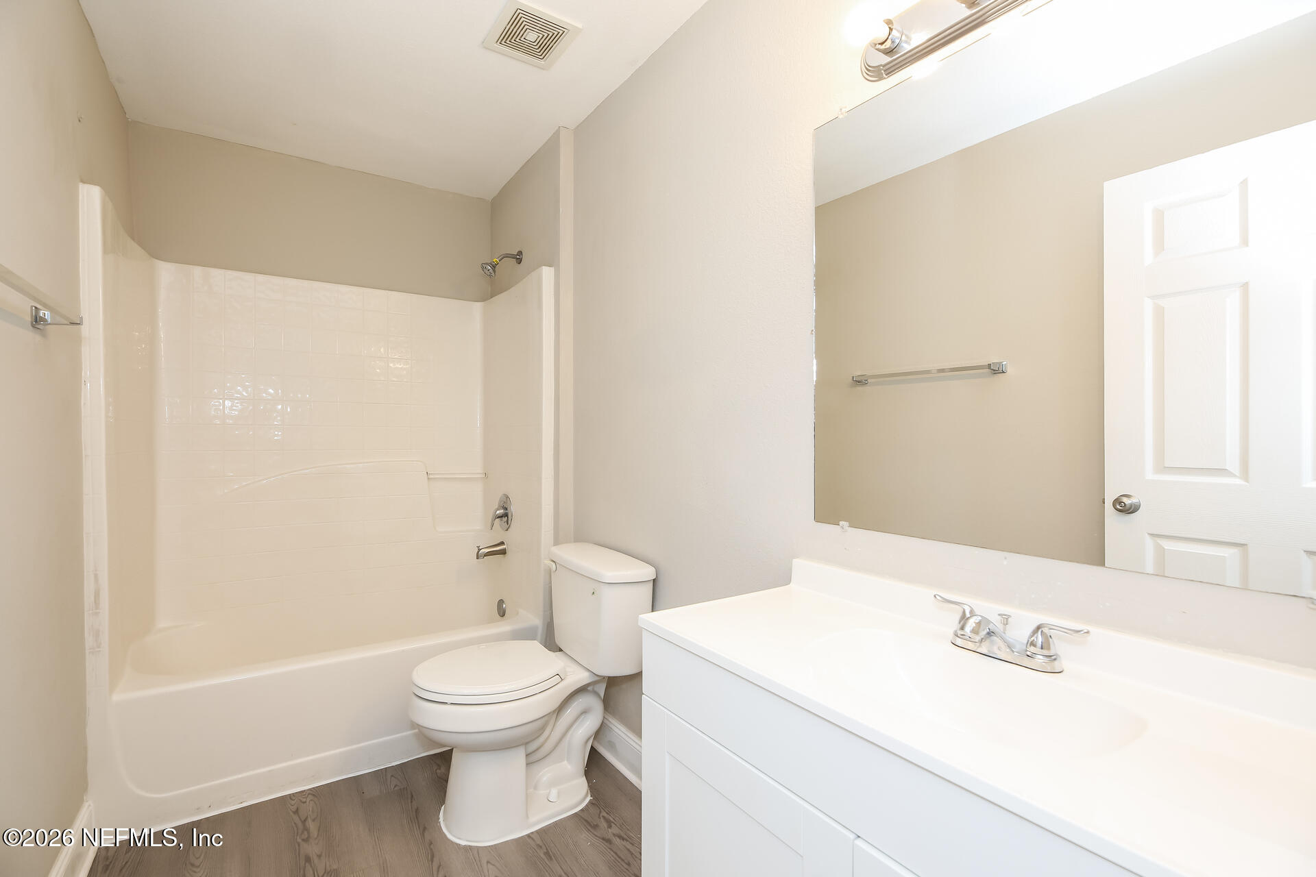 2652 Sunrise Ridge Lane Jacksonville, FL 32277 - Photo 18 of 22 a bathroom with a toilet a sink and a bathtub