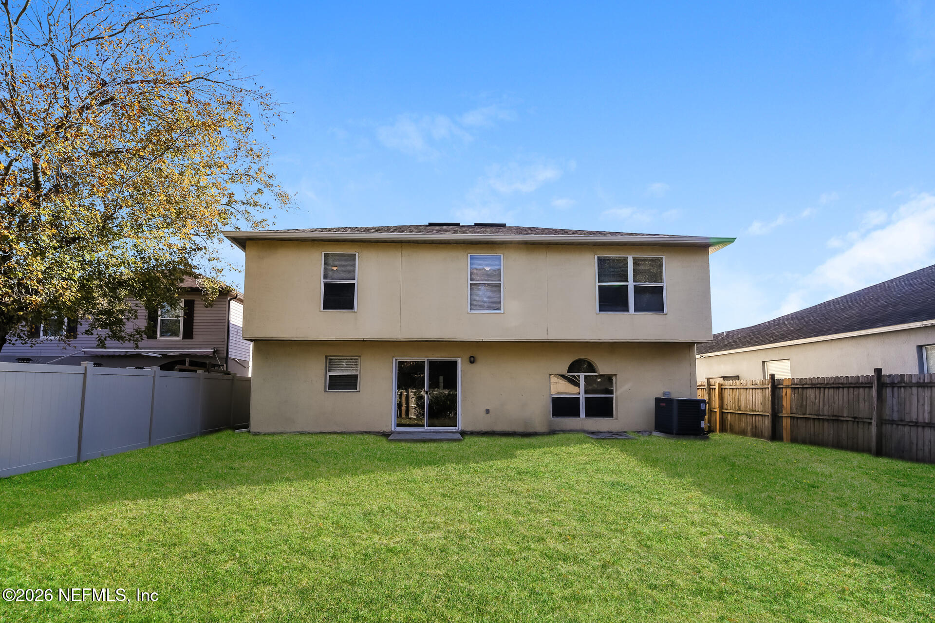 2652 Sunrise Ridge Lane Jacksonville, FL 32277 - Photo 20 of 22 front view of a house with a yard