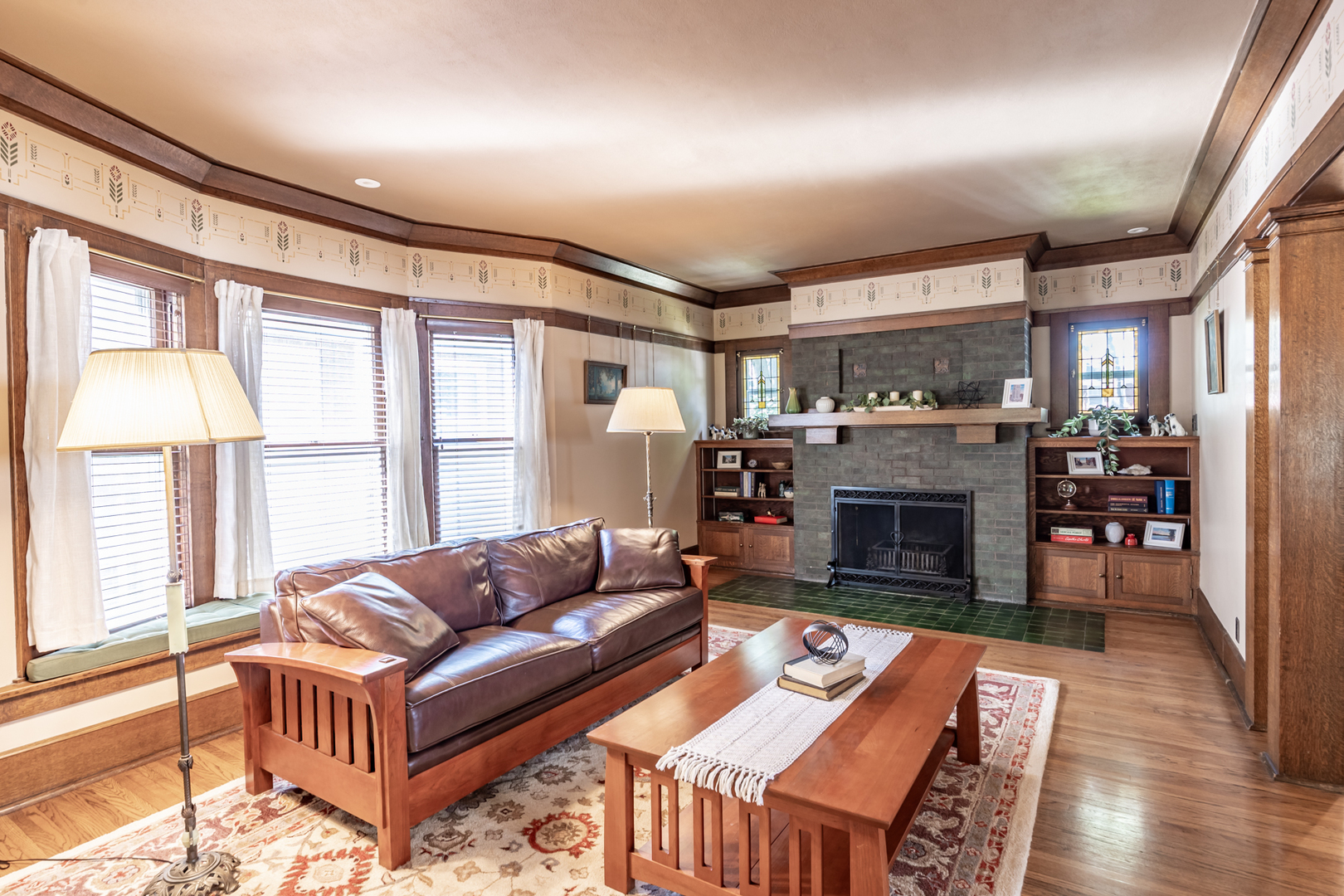 1024 North Spring Street Elgin, IL 60120 - Photo 11 of 35 a living room with furniture and a fireplace