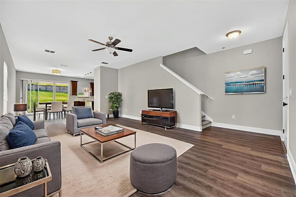 280 Wallrock Drive Ocoee, FL 34761 - Photo 11 of 88 a living room with furniture and a flat screen tv
