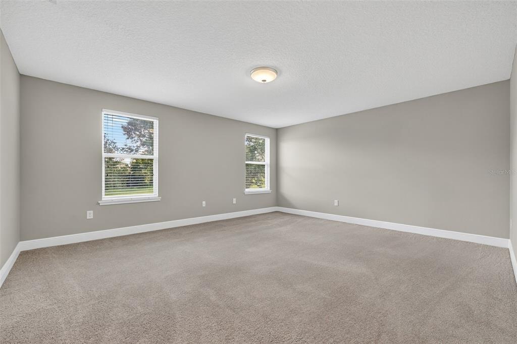 280 Wallrock Drive Ocoee, FL 34761 - Photo 37 of 88 a view of an empty room with a window