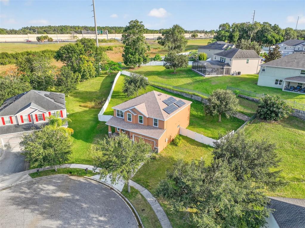 280 Wallrock Drive Ocoee, FL 34761 - Photo 69 of 88 an aerial view of a house with a garden and lake view