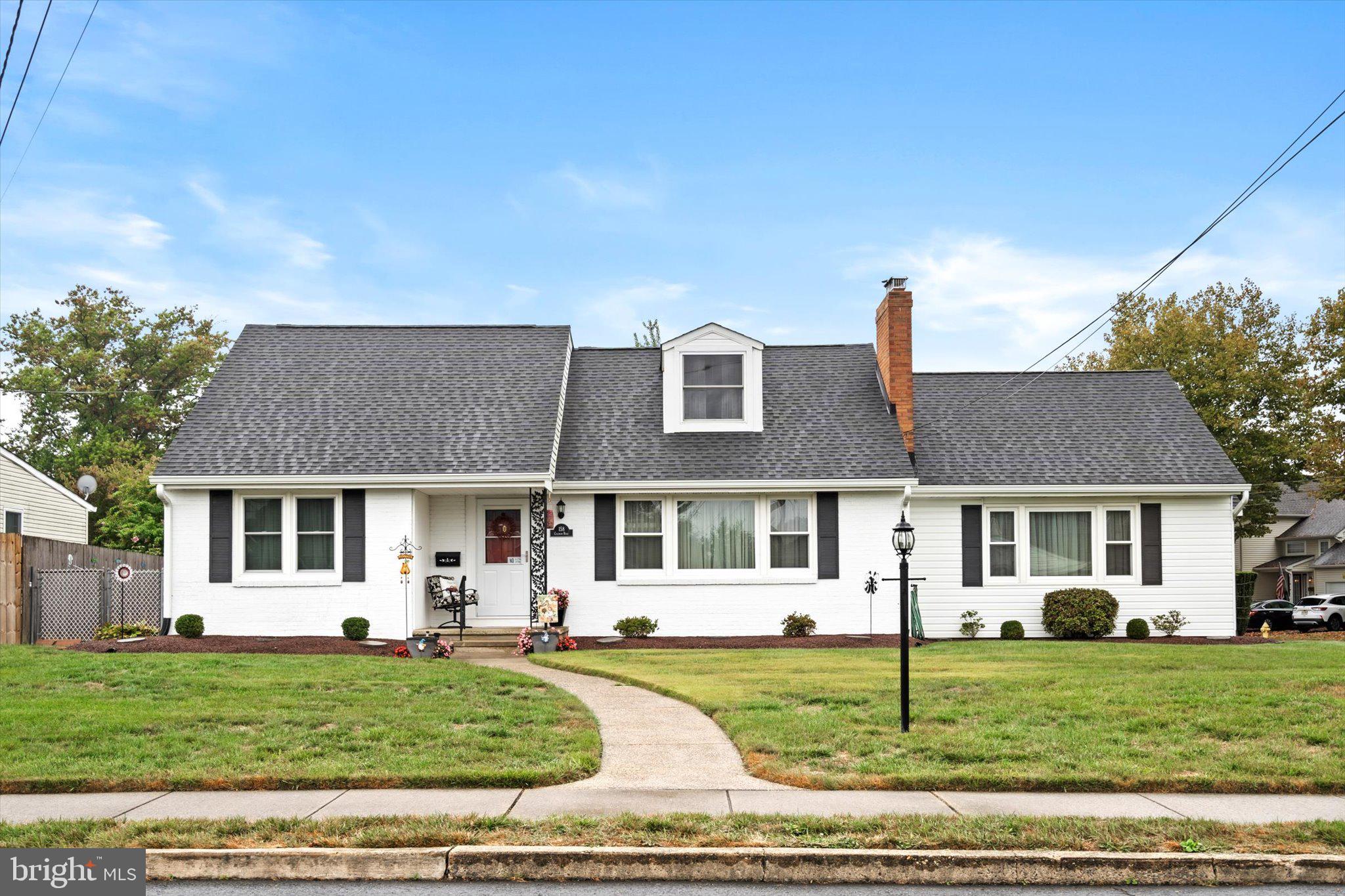 158 Coleman Road Hamilton, NJ 08690 - Photo 1 of 32 a front view of a house with a yard