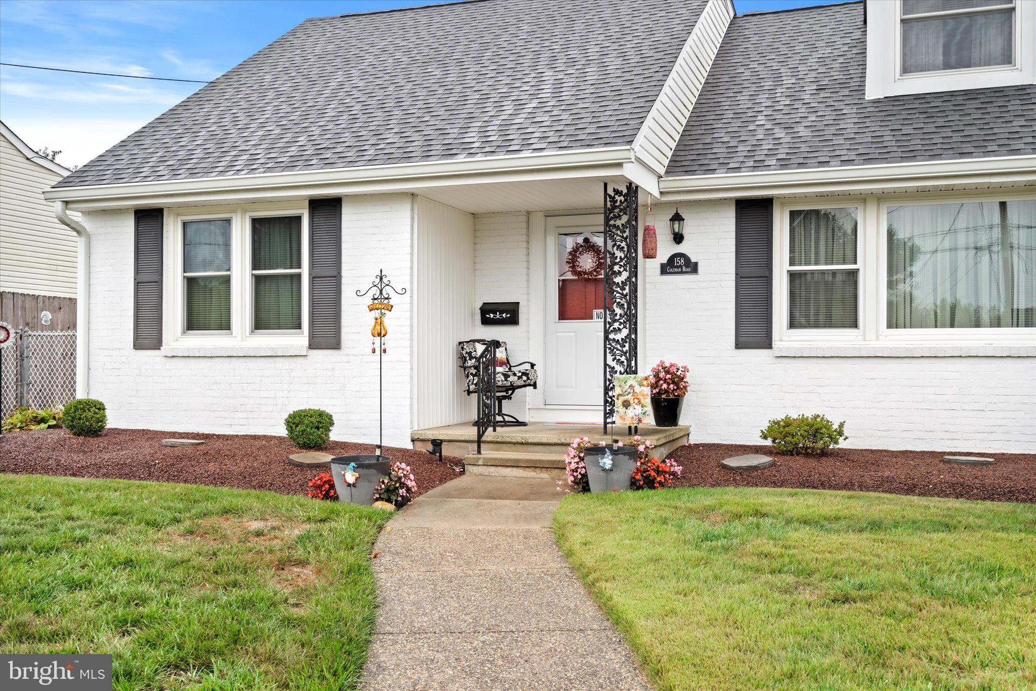 158 Coleman Road Hamilton, NJ 08690 - Photo 2 of 32 a front view of a house with garden