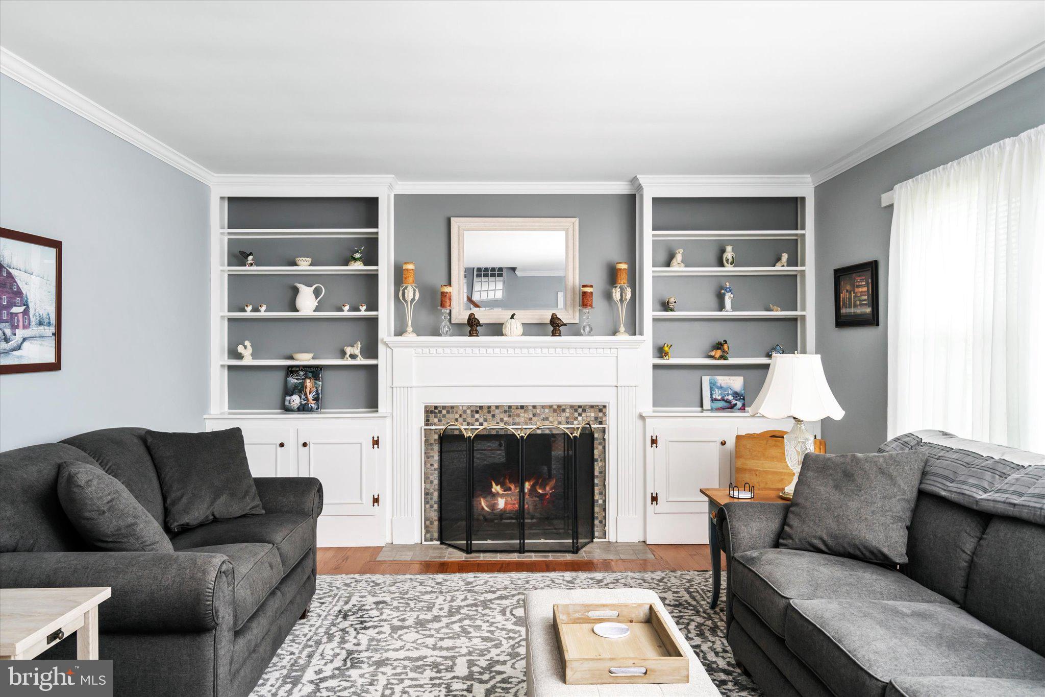 158 Coleman Road Hamilton, NJ 08690 - Photo 6 of 32 a living room with furniture and a fireplace