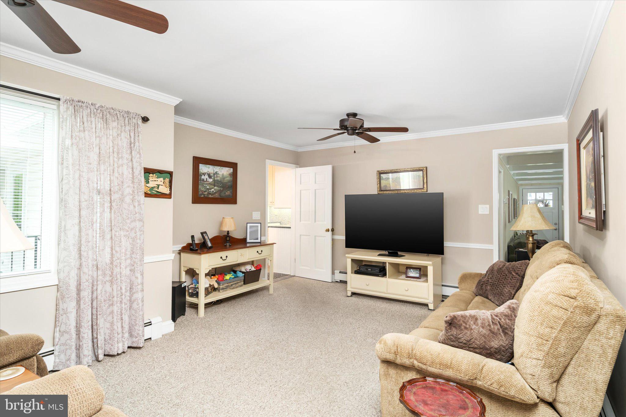 158 Coleman Road Hamilton, NJ 08690 - Photo 9 of 32 a living room with furniture and a flat screen tv