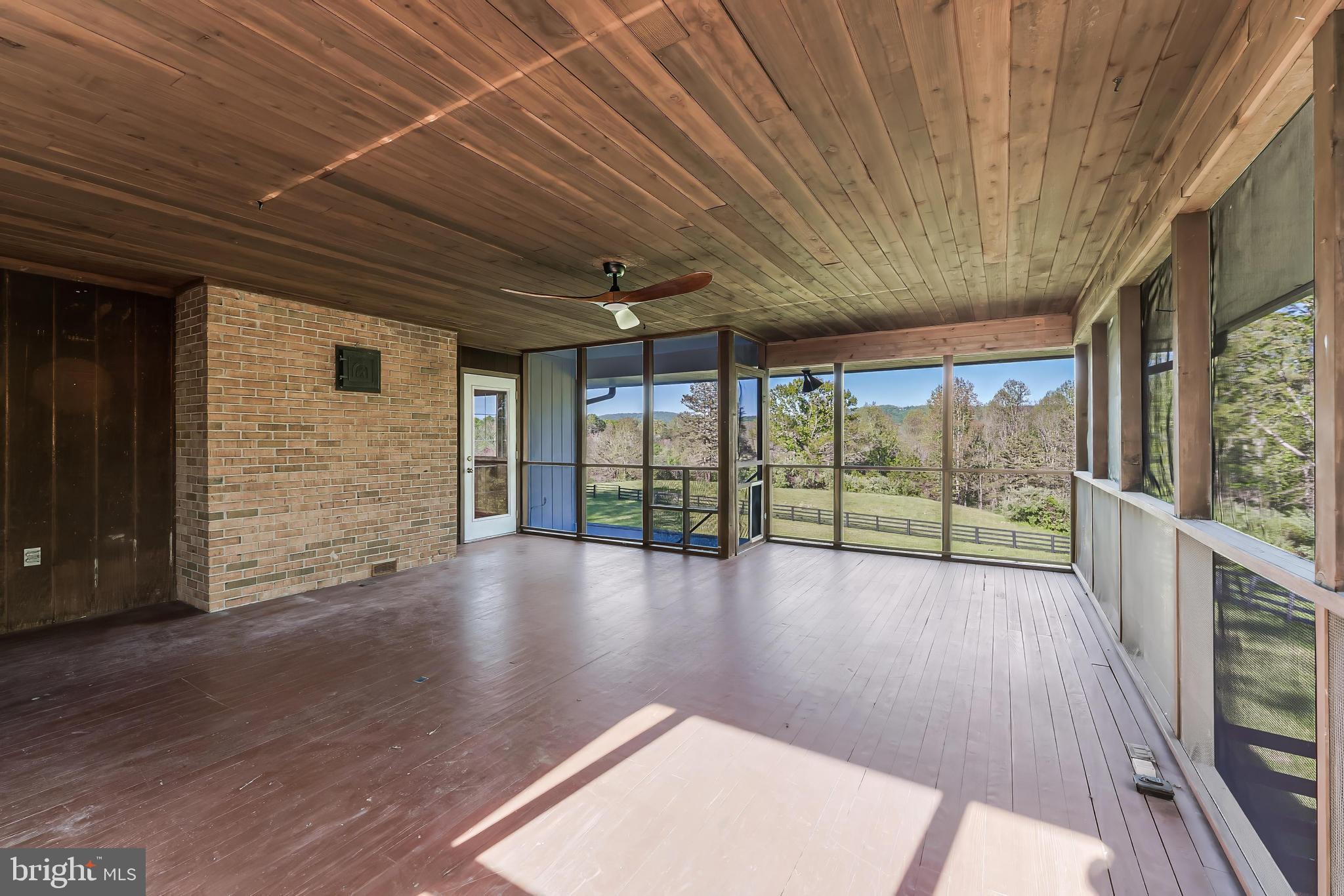 6891 Wilson Road Marshall, VA 20115 - Photo 98 of 118 Spacious sunlit screened porch retreat.