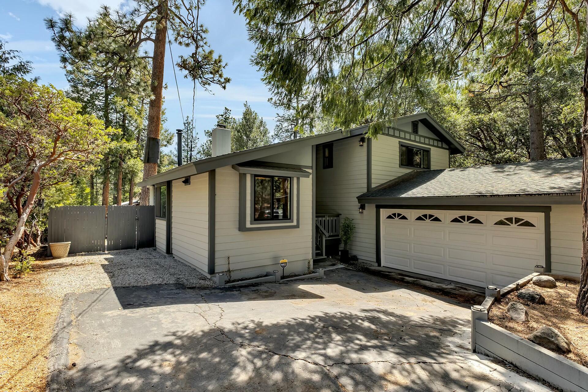 25622 Double Tree Drive Idyllwild, CA 92549 - Photo 3 of 65 a front view of a house with a yard