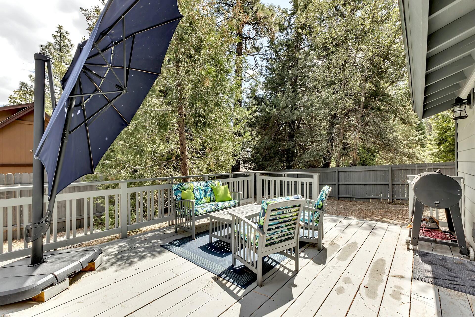 25622 Double Tree Drive Idyllwild, CA 92549 - Photo 52 of 65 a view of balcony with wooden floor and outdoor seating