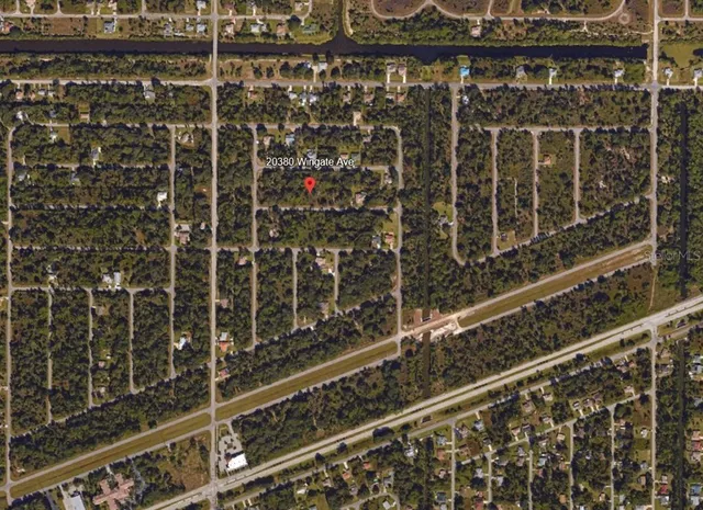 a couple of cars parked in front of house