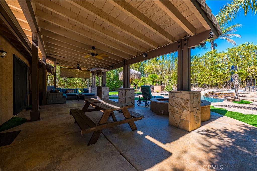 31584 Adour Way Winchester, CA 92596 - Photo 31 of 51 a view of a patio with chairs and a patio