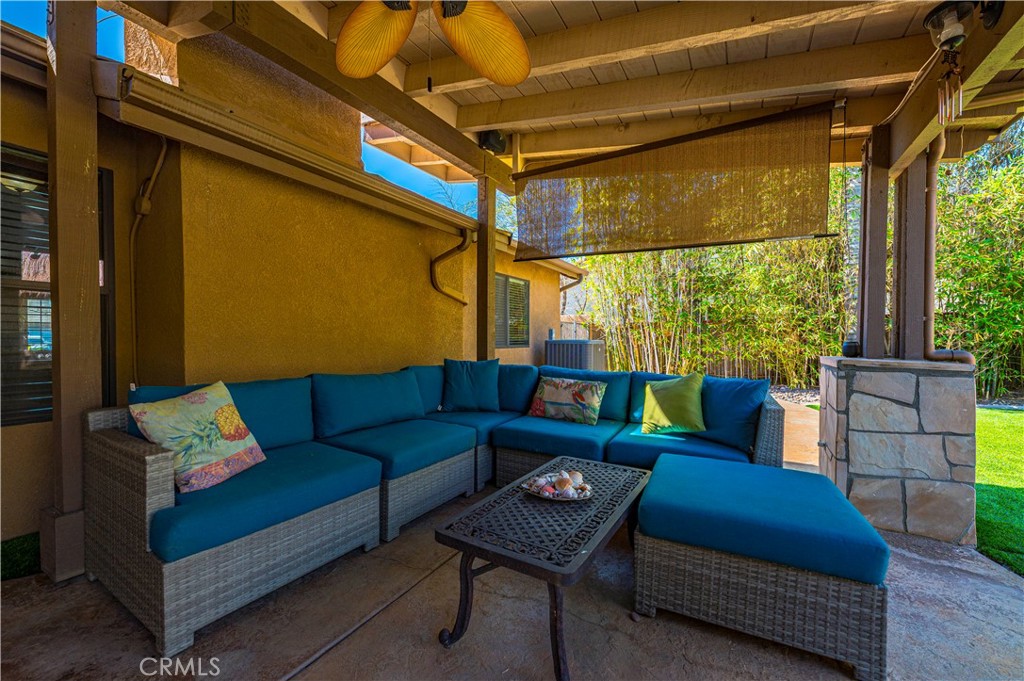 31584 Adour Way Winchester, CA 92596 - Photo 32 of 51 a outdoor living space with furniture and a rug
