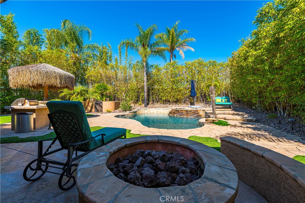 31584 Adour Way Winchester, CA 92596 - Photo 38 of 51 a view of a backyard with swimming pool and furniture