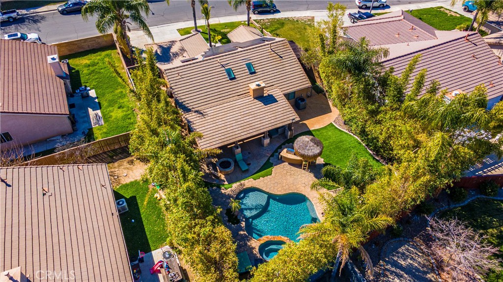 31584 Adour Way Winchester, CA 92596 - Photo 45 of 51 an aerial view of a house with a yard and garden