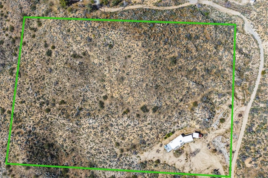 8500 South Samel Road Morongo Valley, CA 92256 - Photo 56 of 75 a view of a yard with plants