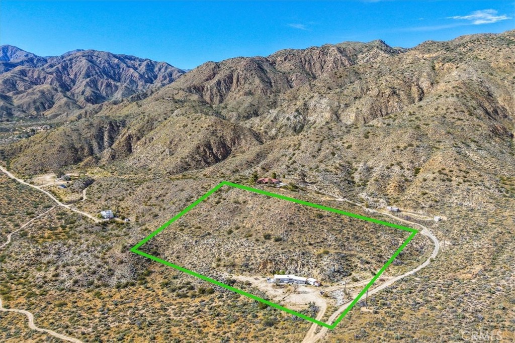 8500 South Samel Road Morongo Valley, CA 92256 - Photo 70 of 75 a view of a field with mountains in the background