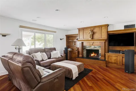 a spacious bedroom with a bed and a window