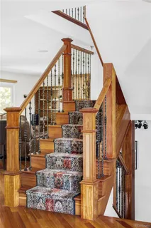 a bedroom with a bed furniture and a window