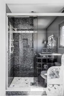 a room with furniture and flat screen tv