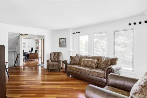 a kitchen with stainless steel appliances granite countertop a stove refrigerator and cabinets