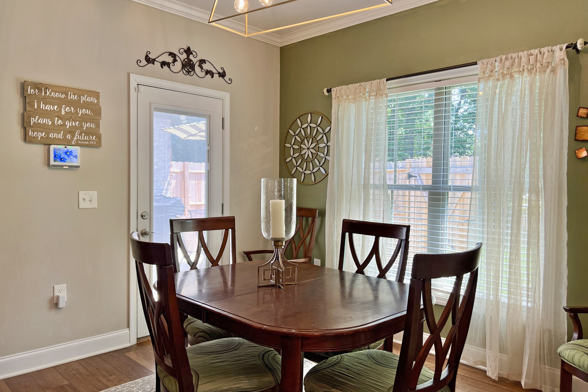 200 Poplar Street Franklin, KY 42134 - Photo 11 of 37 a view of a dining room with furniture window and wooden floor