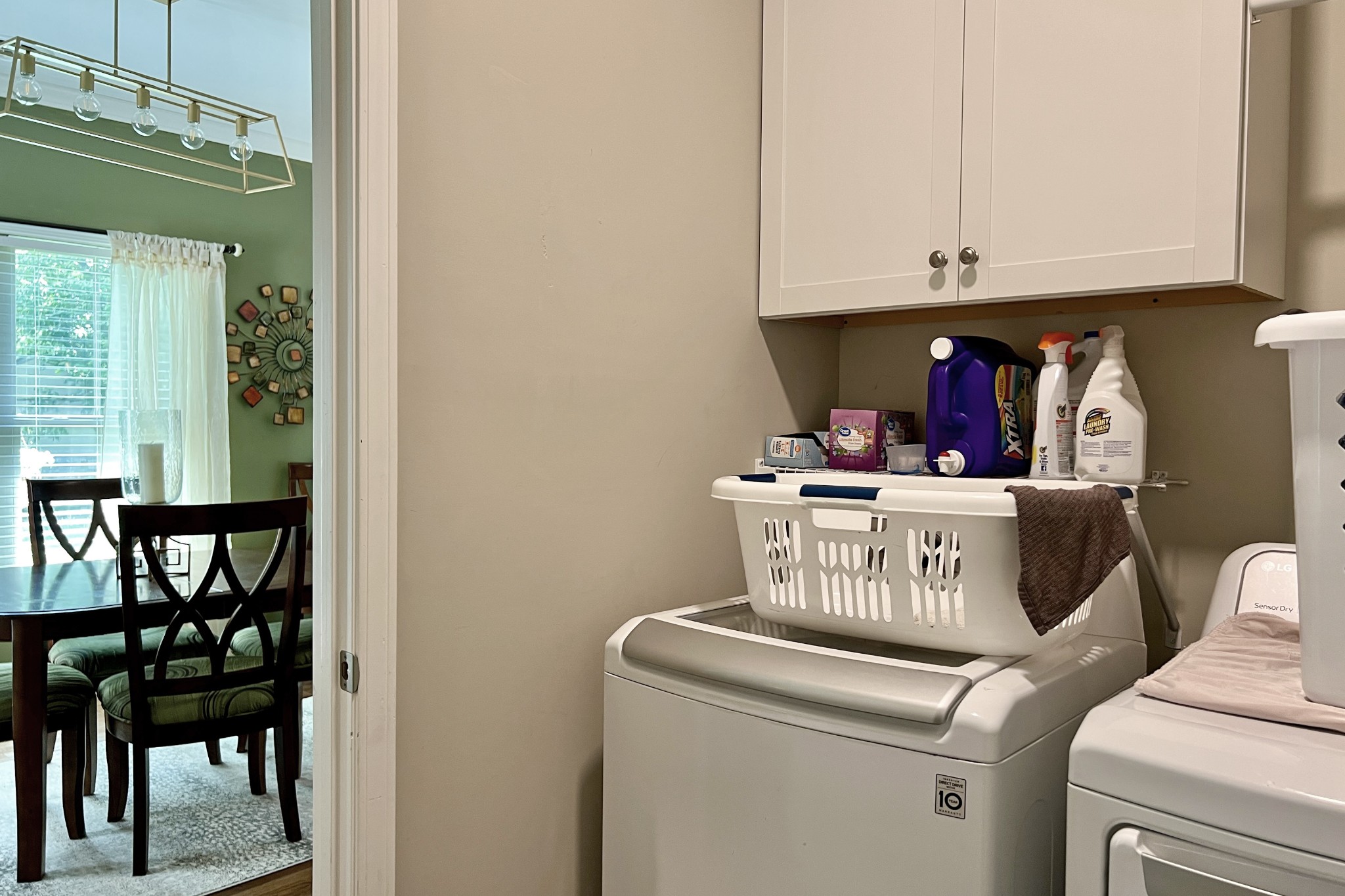 200 Poplar Street Franklin, KY 42134 - Photo 12 of 37 a utility room with dryer washer and a window