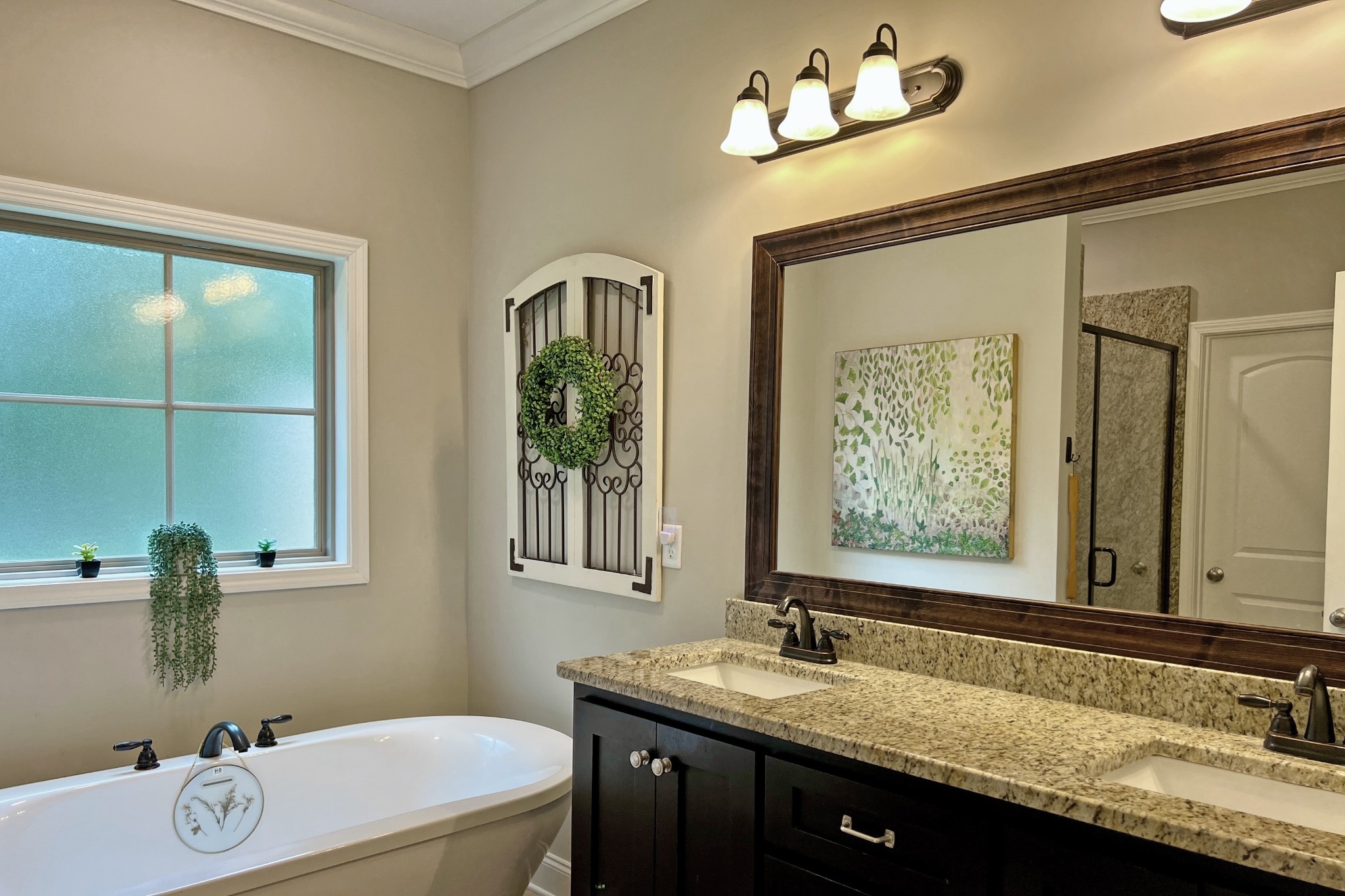 200 Poplar Street Franklin, KY 42134 - Photo 19 of 37 a bathroom with a granite countertop sink a mirror and a window