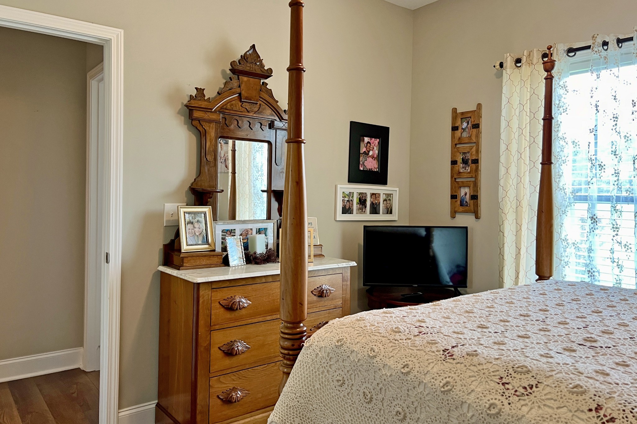 200 Poplar Street Franklin, KY 42134 - Photo 24 of 37 a bedroom with a bed and a dresser in it