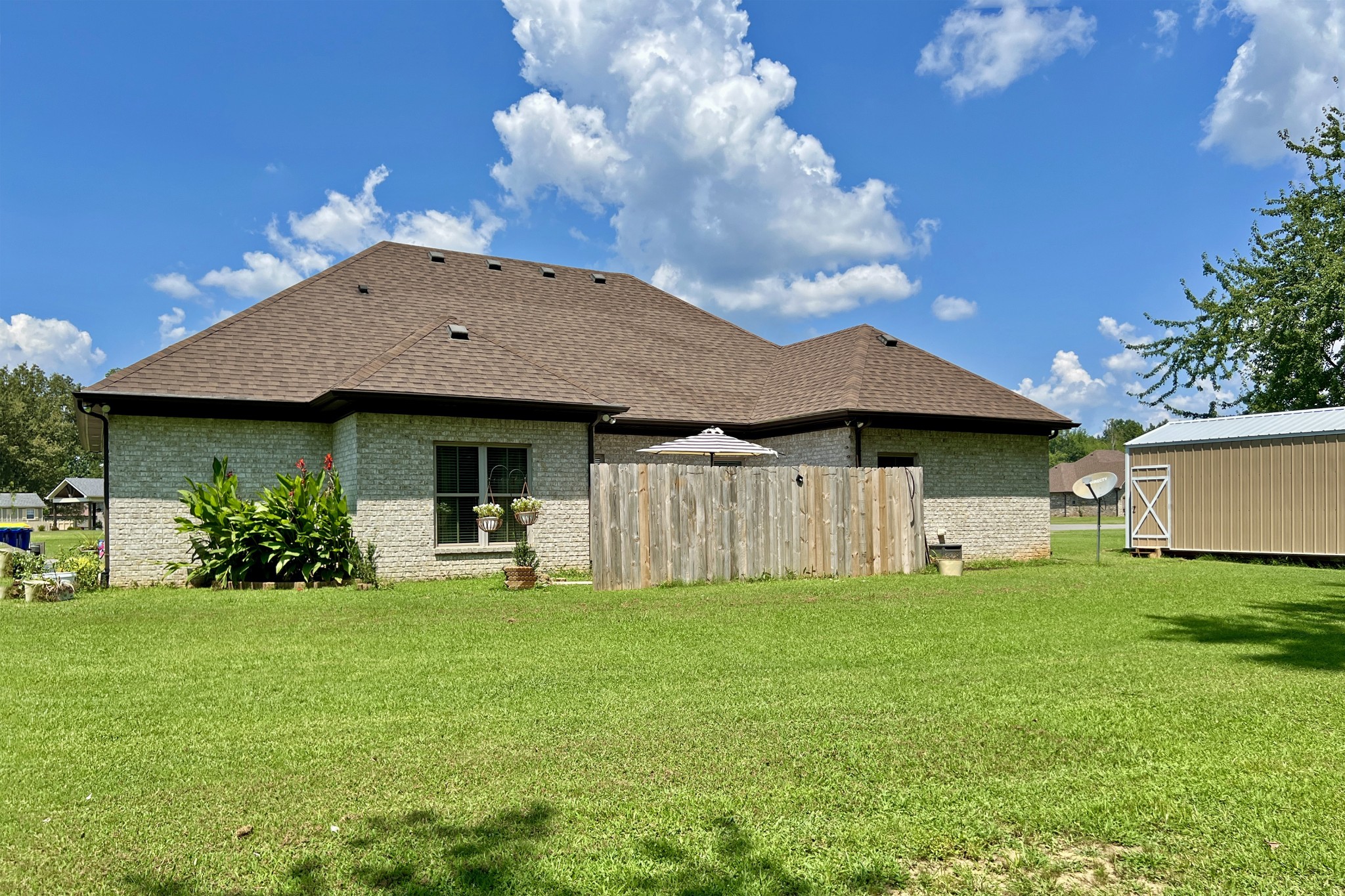 200 Poplar Street Franklin, KY 42134 - Photo 31 of 37 a view of a house with a yard and sitting area