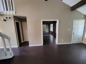 10340 Cook Road, Unit 340 Houston, TX 77099 - Photo 4 of 13 a view of a room with wooden floor and a hallway