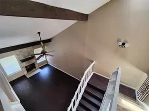 a view of workspace with wooden floor