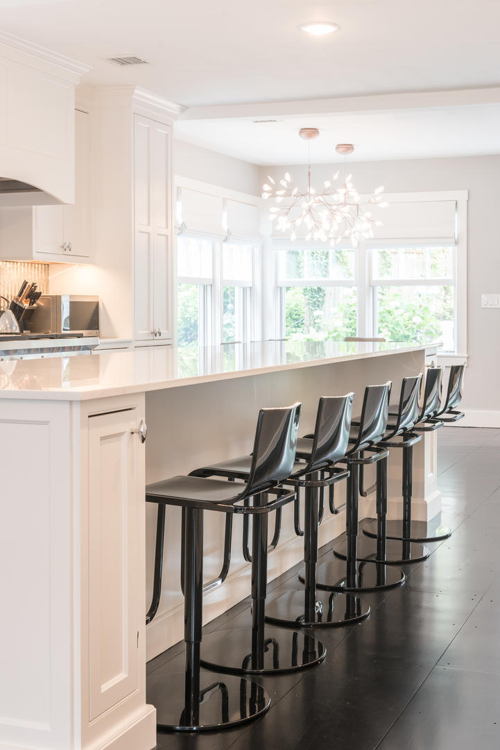 59 Orange Street Nantucket, MA 02554 - Photo 5 of 42 a dining table with chairs and wooden floor