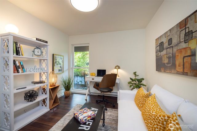 wooden floor with a table and a mirror